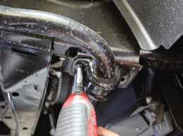 7. Remove the sway bar mounting bolts from the frame using a