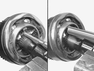 Secure the drive shaft in a vise so that the circlip cutout is upmost. Adapt a drift according to Adapting a drift.