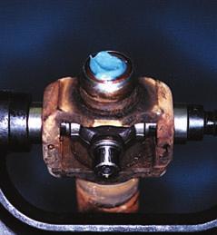 Putting the last needle-bearing cup in the CV joint requires overcoming the considerable force of the compression spring