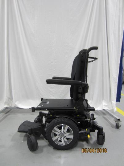 lap belt attached to the Quantum wheelchair seating system was then placed around the ATD s pelvic region.