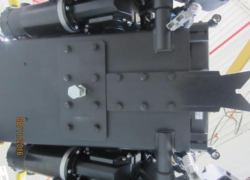 single-point securement bolt during normal vehicle travel. This stabilizing bracket can help resist forward pitching and rearward rotation of the wheelchair during frontal crashes. Figure 4.