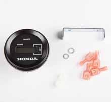 standard Honda original equipment tachometer, key switch, trim meter, and instrument light