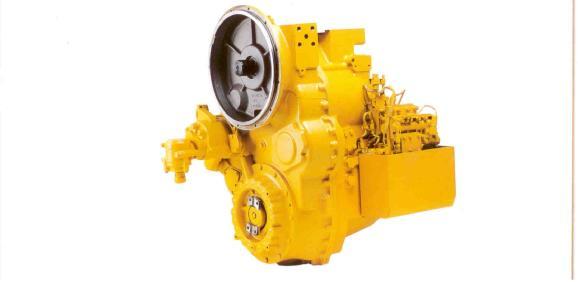 Power-shift gearbox. Caterpillar especially designs and manufactures gearboxes for its own graders. They have nostop, full-power shifting features and inching capability.