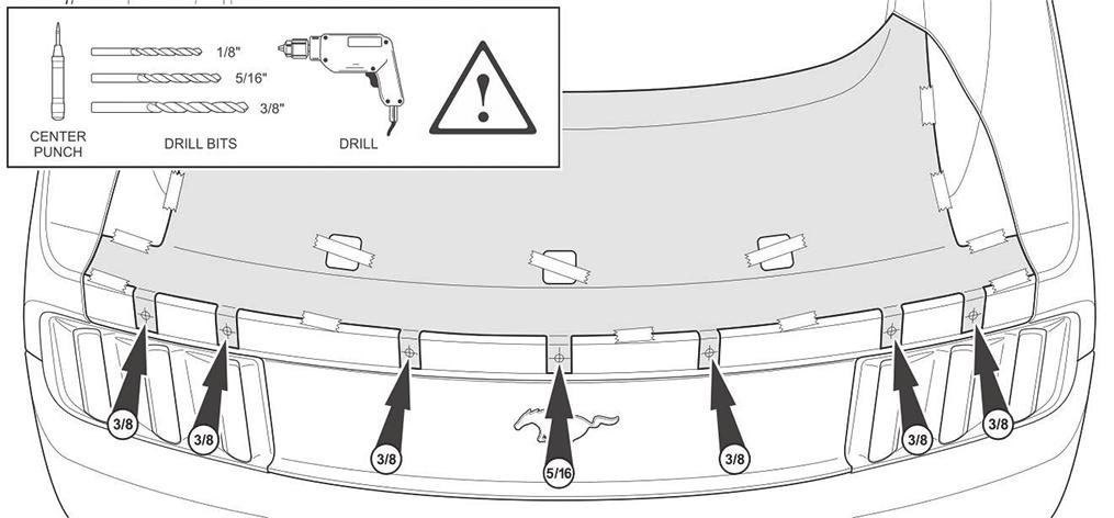 Secure template to trunk lid with masking tape. Attention: Confirm template is properly centered and aligned before continuing to the next step. 13.