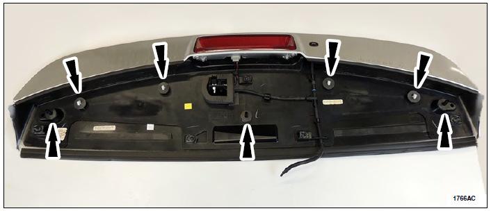 NOTE: Apply Ford sealant (TA-2-B) along the sealing surface of the liftgate tower seal.