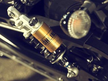 required Specifically developed for the XV-950CR unique front gaiter ÖHLINS SHOCK YA3570000000 XV-950 ÖHLINS PERFORMANCE SHOCK Fully adjustable Öhlins Performance Shock Fully