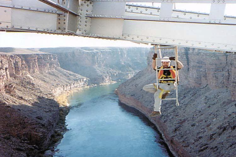 Ladders are also used to climb down to access members of the bridge. The hookladder, as it is commonly referred to, is fastened securely to the bridge framing (see Figure 2.5.
