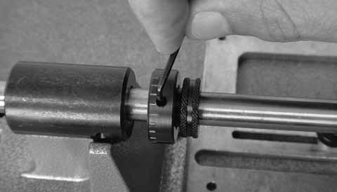 Loosen the setscrew on the Coarse Adjustment Bushing (Photo 17) and the setscrew on the Fine Adjustment Bushing (Photo 18). Photo 17.