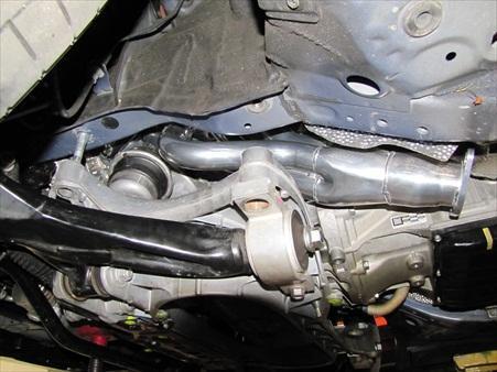 mounting studs, if not replace them with OEM parts. 32) Install one header at a time: a) position the passenger side header first.