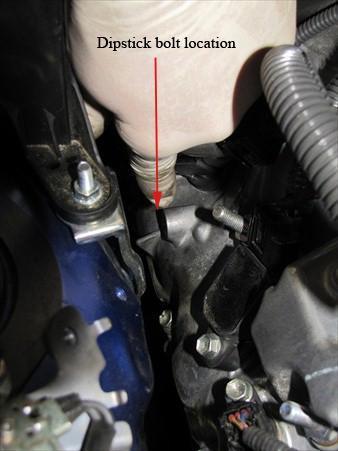 6) Remove 10mm bolt from passenger side valve cover that retains