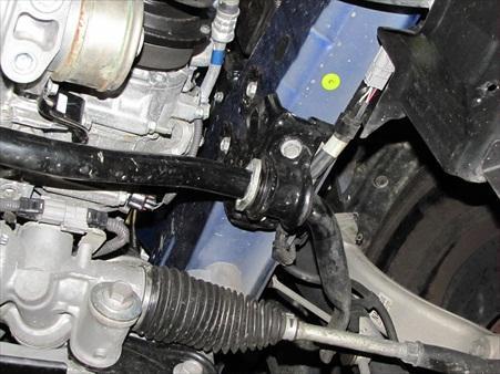 15) Remove sway bar bracket bolts from both sides and remove the U bracket.