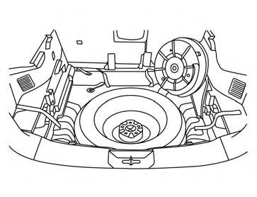 LCE2110 3. Place the sub-woofer in the upper right corner of the trunk, leaning against the 2nd row passenger side seat. 4. Remove the spare tire. 5.