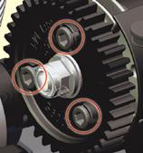 Note: the truck will only roll forward (not backwards) when the spur gear is held stationary. 5. Insert the 2.0mm hex wrench through the clutch drum and into the adjustment screw. 6.