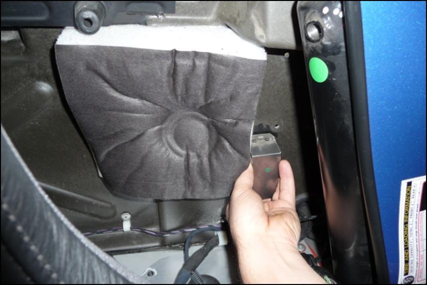 11. To remove the rear speaker panel, it is required to remove the passenger seat and slide the driver seat forward.