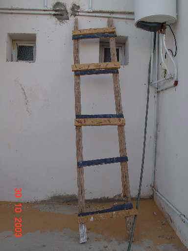 An Approved Ladder An approved ladder usually consists of two side rails joined by regularly spaced crosspieces