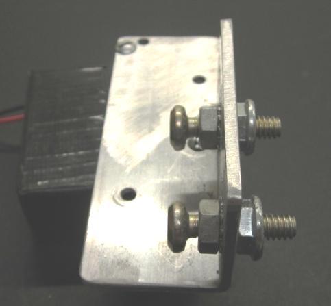 The stock motor bracket has captive nuts and bolts onto the center support.