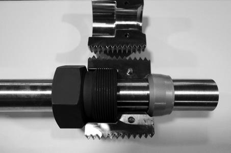 For the 1" size only, assemble the split nut (2-1) around the tubing between the sleeve and gland with the larger counter bore towards the gland and thread into the cap.