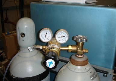 1) Start up the machine: (wait 30 mn) 2) Turn ON the Bottles: Turn ON the Air compressed (bottles on the left) until 24 psig Pressure