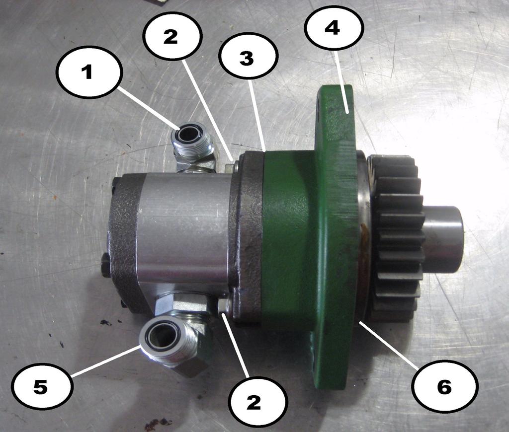 3.2 Gear Pump Installation Note: Due to tight clearances in the area of the auxiliary drive on the engine, the adapter and gear pump with fittings and pressure hose must be pre-assembled before