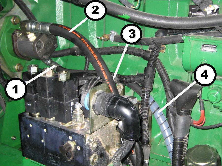 3.4.5 Routing of Pump Hoses Route pressure line from pump behind electrical harness along engine block as shown in Figure 14.