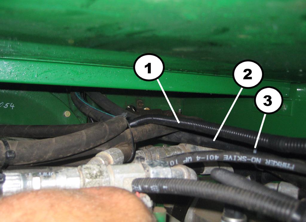 3.5 Electrical Installation 3.5.1 Wire Harness Installation 3.5.1.1 Start of Wire Harness. Begin with the main wiring harness under the fuel tank, behind the transition.