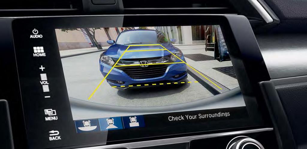 Your safety is our priority. MULTI-ANGLE REARVIEW CAMERA 12 Civic Touring Sedan shown in Lunar Silver Metallic.