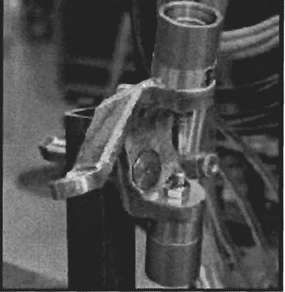 All of the points for attachment of the suspension links were fabricated in a similar fashion, using fixtures which located the rotation axis of the suspension members relative to the chassis