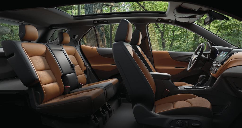 Equinox Premier interior in Brandy with Jet Black accents and available features. 1 Does not detect people or items. Always check rear seat before exiting. SIT BACK AND ENJOY.