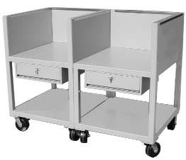 The workstation table is made of 2" (5.08 cm) steel tubing. The sides and back walls are 2" (5.08 cm) thick lead bricks covered with steel panels on both sides.