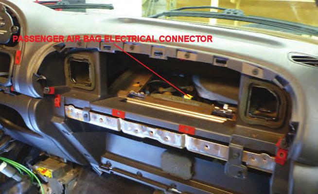 Remove the knee panel below the steering column and the stamped steel cross brace along the bottom of the dash. 15.