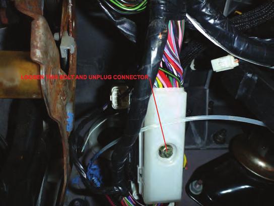 already removed for clarity. 20. Loosen the bolt and disconnect the large electrical connector near the clutch pedal as shown below: 22.