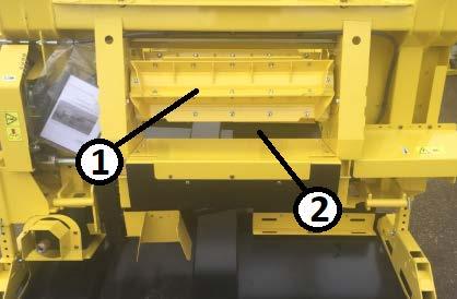 Feed Roll Stop Bolts For optimum feeding in most conditions, the feed roll is retained in a fixed position to allow for proper feeding of ears to the feedrolls. See Figure 13.
