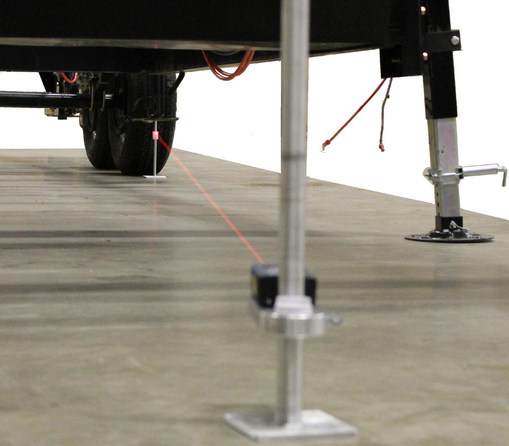 Correct Track Suspension Alignment System Adjustment Procedure 5. Align the laser with each target (Fig.