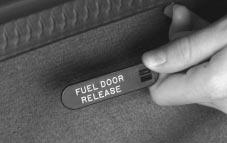 If your fuel filler door release won t operate, there is a manual release tab.