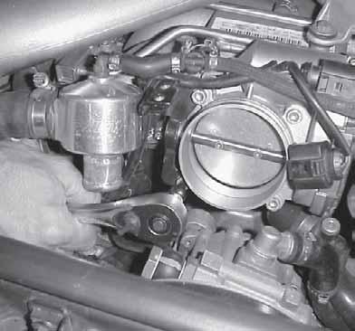 25. Remove all throttle body bolts