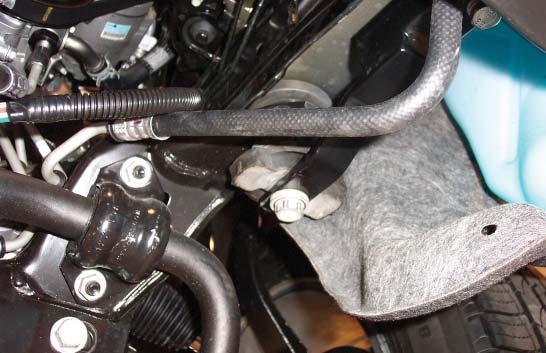 the main receiver brace and into the tow hook mount (Fig.T).