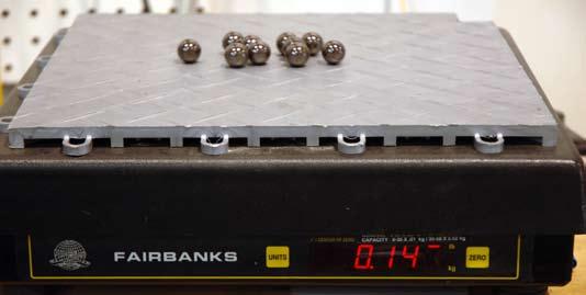 10 silicon nitride balls weigh 0.14 pounds Porsche 6 steel balls weigh 0.
