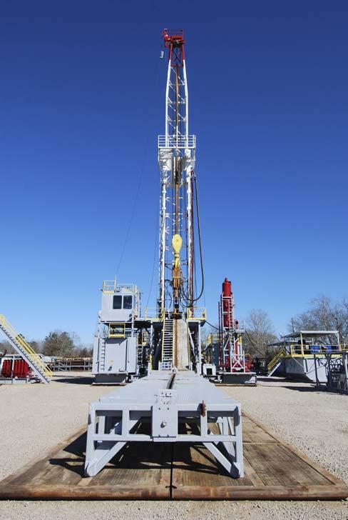 750HP PORTABLE DRILLING RIG W/ WALKING SYSTEM PAGE 1 OF 7 DRAWWORKS: TSM 7000 Drawworks, 750hp, grooved f/1-1/8 Drill Line, p/b 540HP CAT C-15, w/allison CLT- 6061 Automatic Transmission, Right Angle