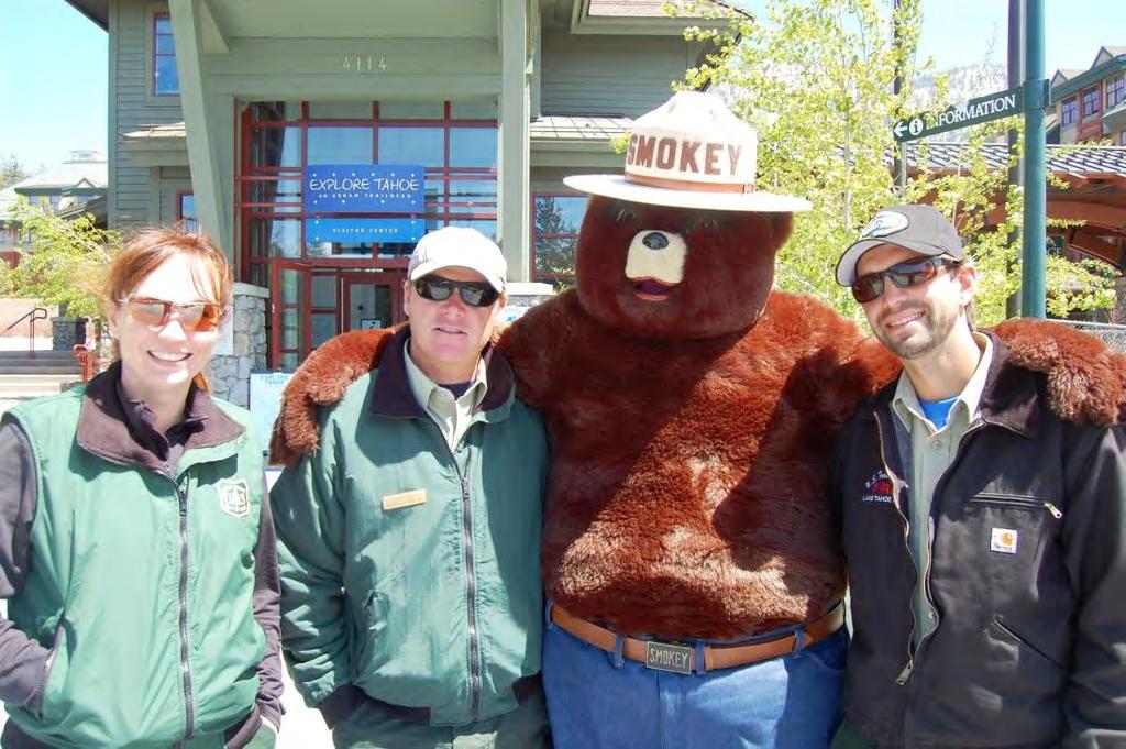 Beth Brady and Smokey Bear s US Forest Service helpers at