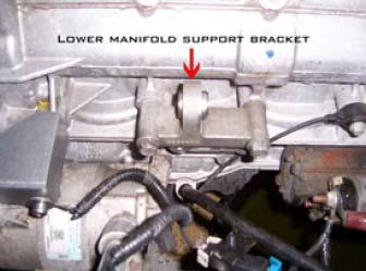 Remove the fuel rail by tilting/twisting/wiggling out from under the coolant line. Next remove the (4) injector clips, injectors themselves, and injector cups from the heads.