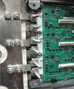 Remove the tie down capacitor mounts and save screws and capacitor mounts. c. Remove the six setscrews from each IGBT and save.