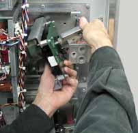 Chapter 3 7. Remove assembly by lifting the assembly up and turning it slightly counterclockwise while rotating the top of the output busbar toward you and around the U, V, or W busbar. 8.