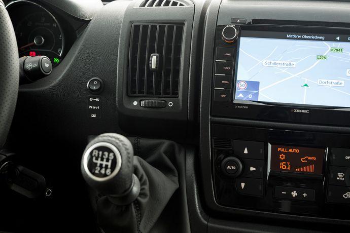 An optional multi-functional steering wheel and an automatic air conditioning