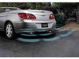 Four ultrasonic sensors are discreetly integrated into the rear bumper, activating an