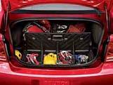 These organizers can be divided into storage bins to hold standing grocery bags or folded flat for use as a security cover to hide items stored below. Installs and removes easily behind the rear seat.