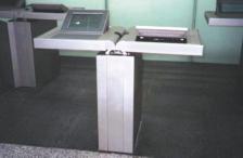 With the counter surfaces folded up the passenger can check flight and baggage details on the built in monitor and keyboard. A PC and printer are housed in the central support console.
