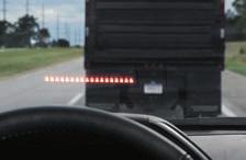 Visual guides help you see how close you are to objects around the vehicle so that you can avoid them.
