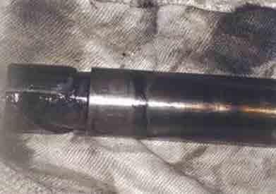 b) Wornout cylinder liner Damage  c) Damaged piston