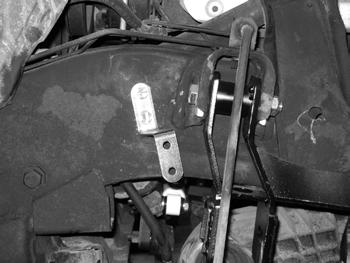 (See Figure 6B) For non-abs equipped vehicles, mark a hole location inline with the upper control arm bracket bolt approximately 2-3/4" forward of the upper control arm pocket.