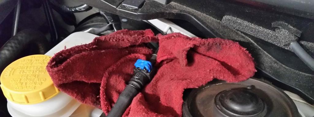 Fuel line disconnection: Pull away the other end of the fuel line to release it from the hard